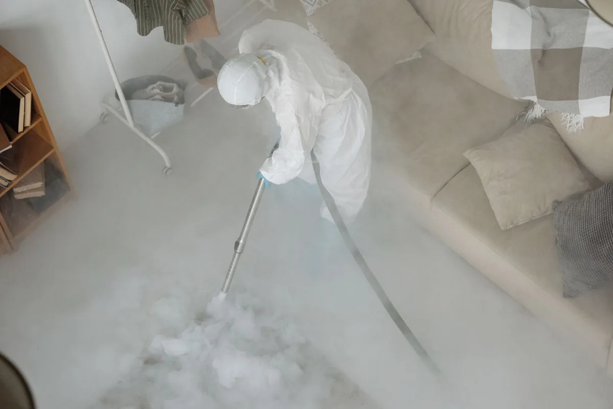 Biohazard cleanup technician in protective equipment, Searles Valley, CA
